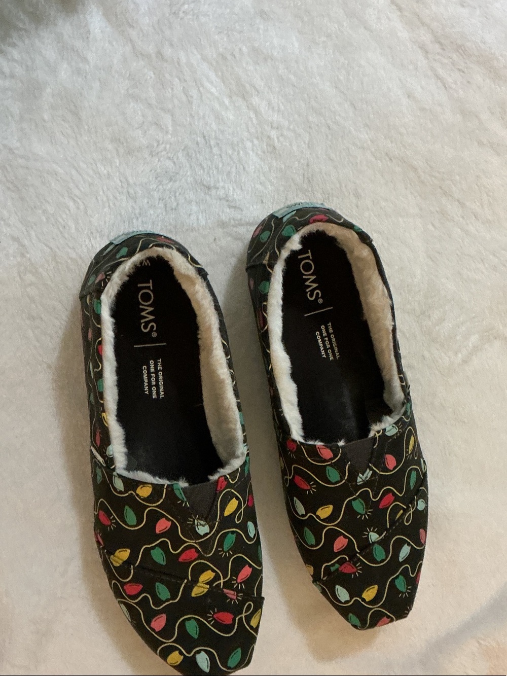 Toms Black Canvas Slip-Ons with Multicolor Leaf Accents
